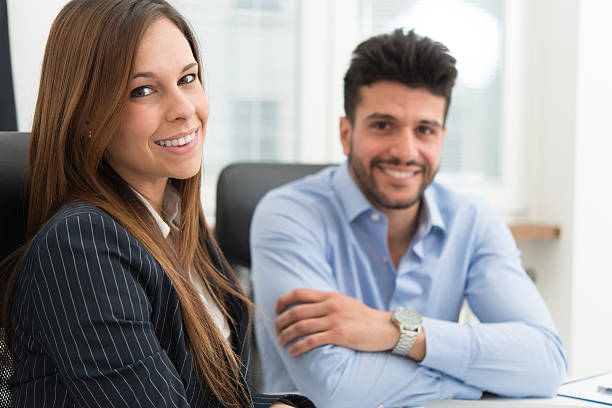 istock Smiling business people 595753654