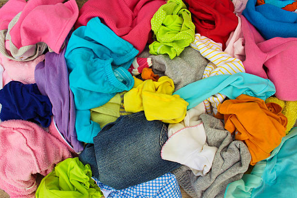istock Pile of carelessly scattered clothes. 595754180