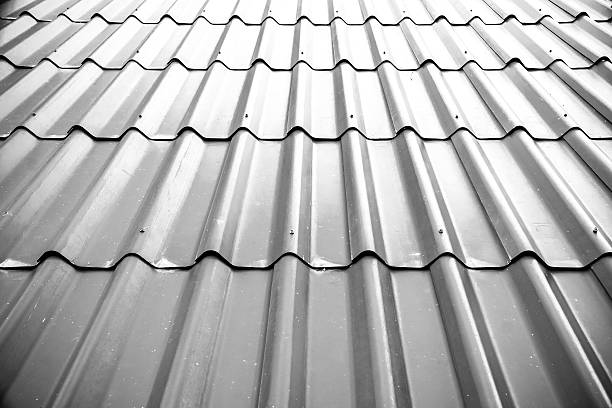 istock Gray tile roof floor background. Closeup roofing texture pattern. 595757630