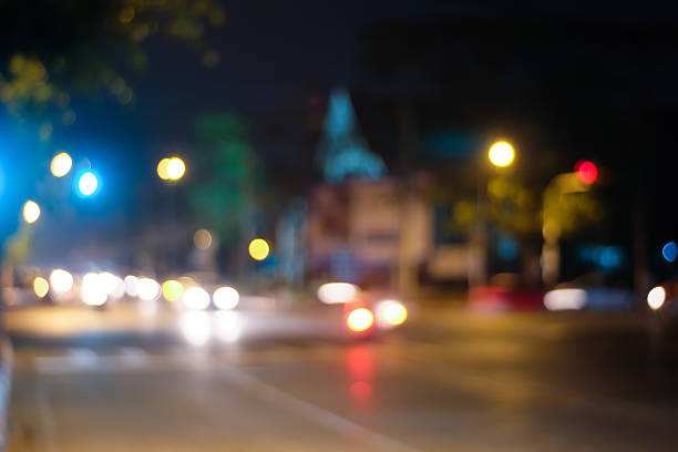 istock Blur traffic light on the road during the night background. 595757776