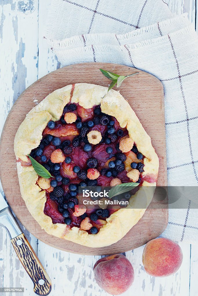 sweet pie homemade pie with peaches and blackberries Baked Pastry Item Stock Photo