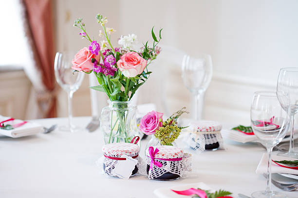 istock Wedding banquet, small restaurant floral, decor in red, informal style. 595758530