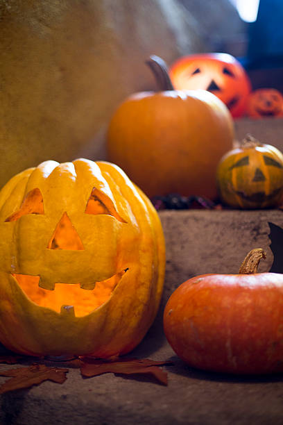 istock Halloween pumpkin decoration on stone stairs 595760314