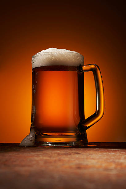 istock foamy beer in a glass 595760406