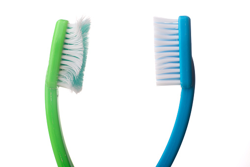 Used old tooth brush and new tooth brush on a white background