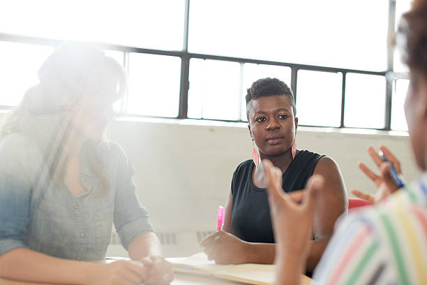 istock Unposed group of creative business people in an open concept 595761432
