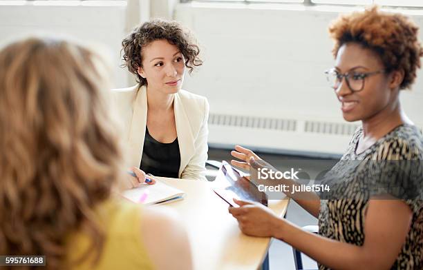 Unposed Group Of Creative Business People In An Open Concept Stock Photo - Download Image Now