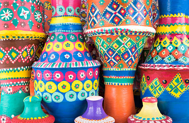 istock Composition of artistic painted clorful handcrafted pottery vases 595761916