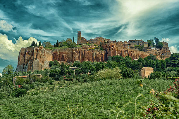 Town of Orvieto, Umbria, Italy, toned View at ancient town of Orvieto, Umbria, Italy, toned image orvieto stock pictures, royalty-free photos & images