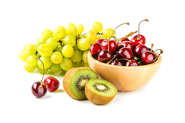 istock Grapes, cherry and kiwi in the bowls 595763442