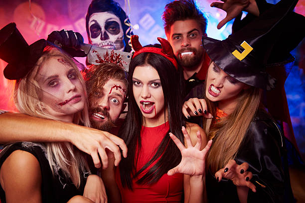 grupa przerażających przyjaciół na imprezie - costume expressing positivity cheerful close up zdjęcia i obrazy z banku zdjęć