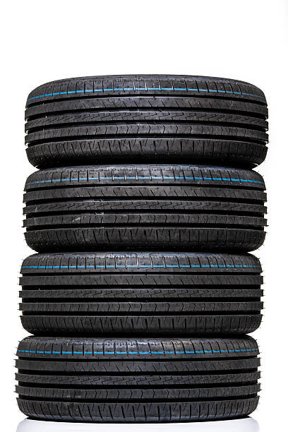 istock Stack of brand new high performance car tires 595766582