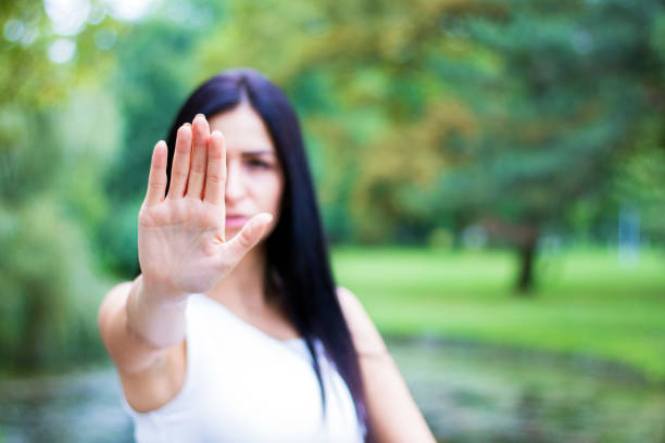 istock woman says stop 595768234