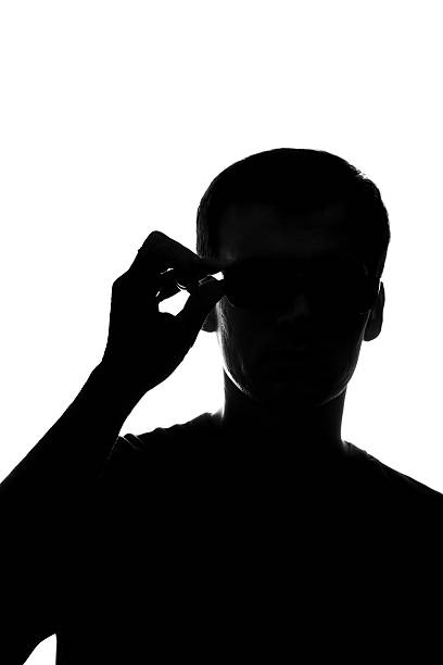 istock The young man thought holding the glasses 595769354