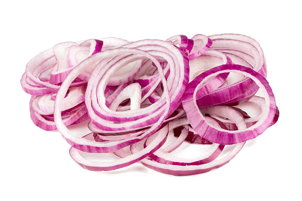 istock slices of red onion isolated on white 595770964