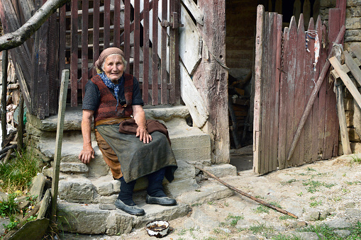 Oreshaka, Bulgaria - August 3, 2016: Vesa - 96 years old Bulgarian woman lives alone in her old cottage in the outskirts of the village