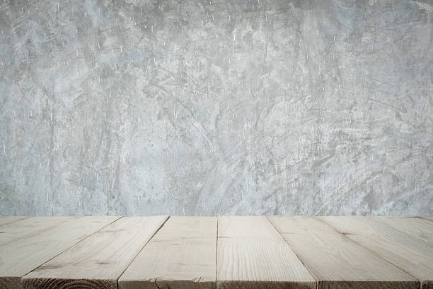 istock Wooden floor or wooden table with concrete wall. 595772252
