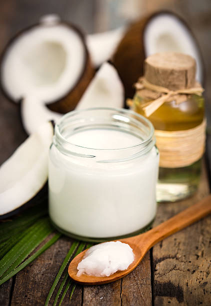 istock Coconut oil on the wooden table 596042014