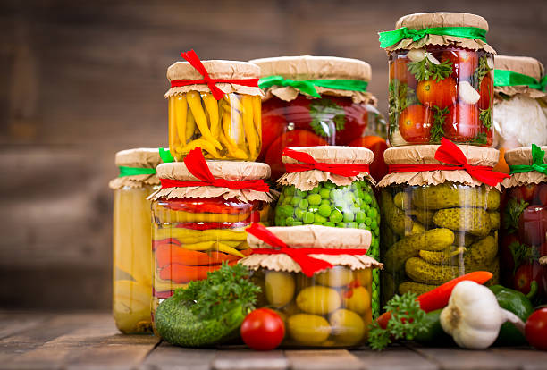 Preserved vegetables in the jars stock photo