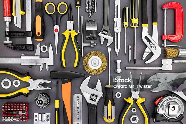 Set Of Hand Various Work Tools On Grey Background Stock Photo - Download Image Now - Work Tool, Hardware Store, Toolbox