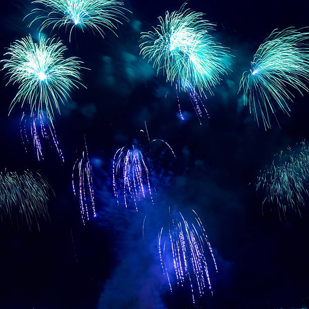 istock Colorful blue holiday fireworks 596044044
