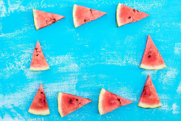 istock pieces of a ripe red water-melon 596044306