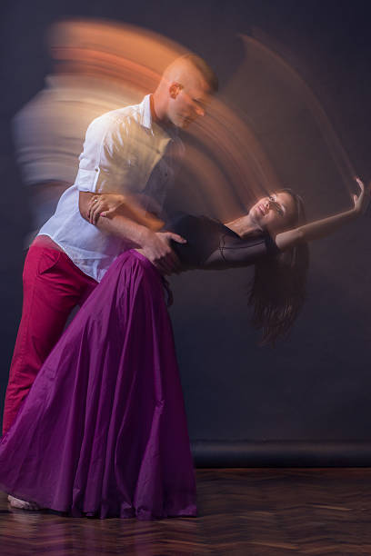 istock Dance couple motion blur long exposure 596047462