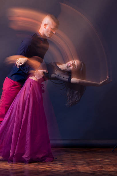 istock Dance couple motion blur long exposure 596047518