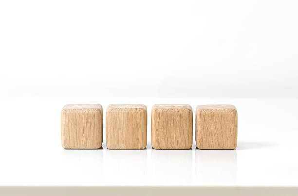 https://media.istockphoto.com/id/596049012/photo/four-wooden-cubes-on-white-table.jpg?s=612x612&w=0&k=20&c=sS5W4DdQr-Nduf6Du4SPeq5xj07r-k6gA7qcZsQRtQY=