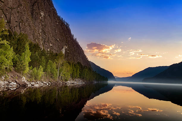 istock Mountain landscape with the sunrise and the river 596050196