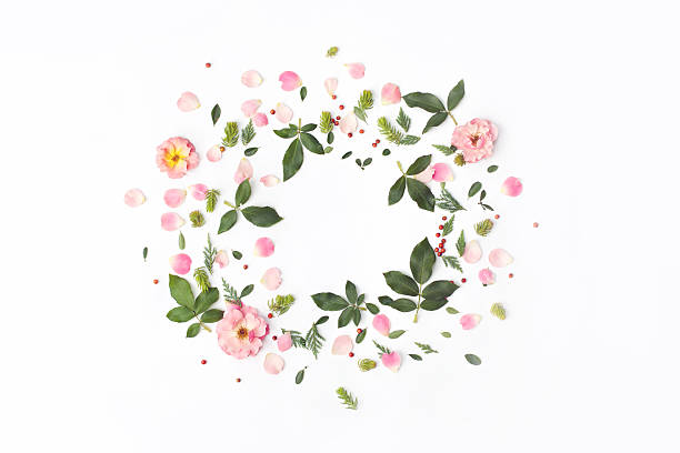 istock Floral round frame with rose flowers, petals, red berries 596052332