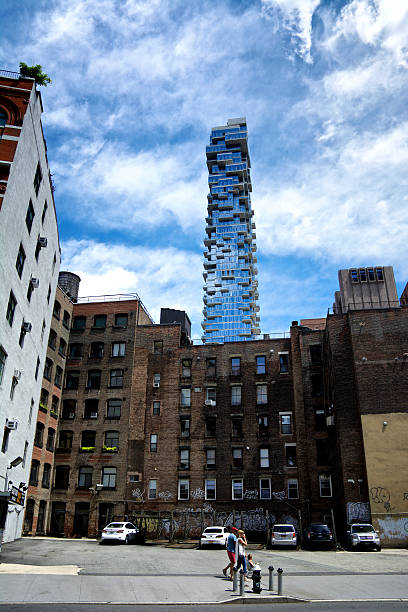 people in tribeca manhattan cityscape, architectural contrasts, new york city - caucasian three dimensional shape men sky imagens e fotografias de stock