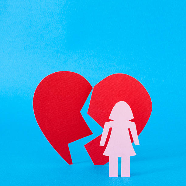 istock Woman and broken heart 596056074