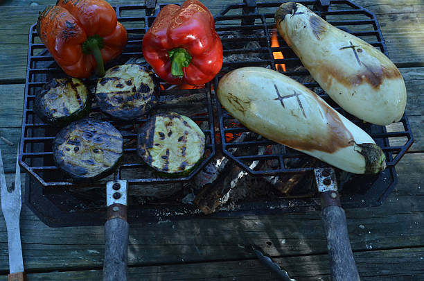 istock Flames in Hibachi grill cooking vegetables 596057000