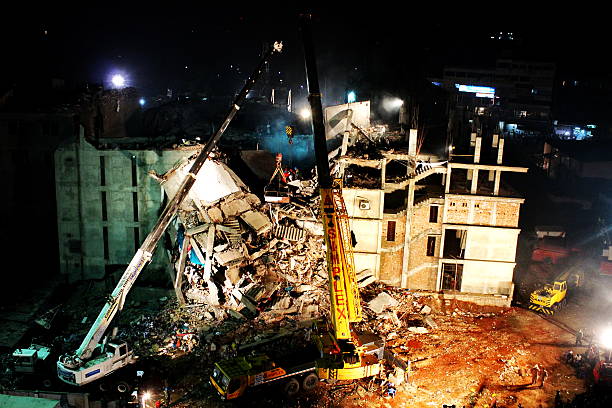 Dhaka, Bangladesh - April 29, 2013: A view of collapsed Rana Plaza building in Bangladesh. Over 1,130 workers of apparel factories were killed and 2500 others were injured when the eight-storey factory build collapsed on the outskirts of Bangladesh capital Dhaka in 2013. Bangladesh is one of the major countries supplying readymade garments to leading apperal brands of USA and Europe. Bangladesh also earns over US$ 28 billion a year by exporting apparel items.