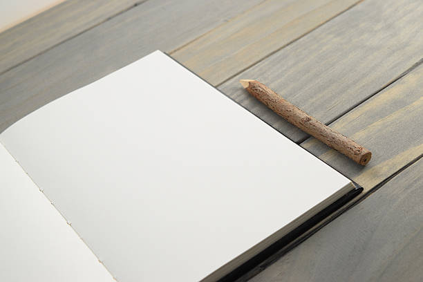 istock Empty notebook paired with wooden pencil 596059780