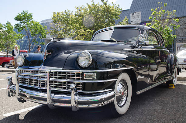 Antique Car: 1946 Chrysler New Yorker Rimouski, Canada - August 7, 2016: This is at an Antique Car Show Exposition during a weekend in Rimouski.  new york state license plate stock pictures, royalty-free photos & images