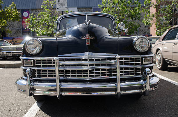 Antique Car: 1946 Chrysler New Yorker Rimouski, Canada - August 7, 2016: This is at an Antique Car Show Exposition during a weekend in Rimouski.  new york state license plate stock pictures, royalty-free photos & images