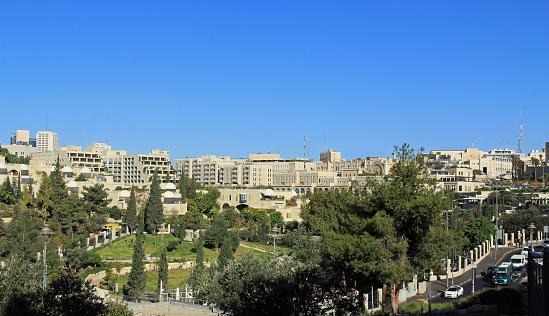 Jerusalem, Israel – October 22, 2013: Panoramic view of the modern city of Jerusalem in Israel next to a park.