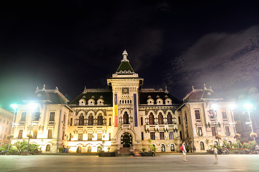 Сraiova, Romania - August 16, 2016: Town hall in Romanian city of Craiova is the local and regional government building and a major landmark on the Mihai Viteazul square in downtown Craiova, one of the largest cities in Romania.