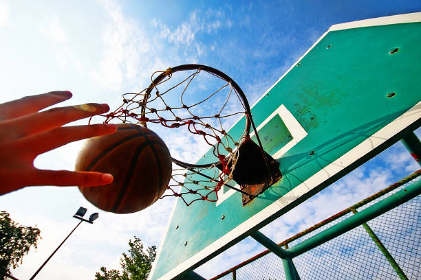 istock Basketball thrown in the hoop, scoring in game 596065410