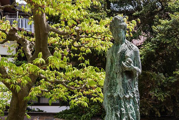 The old statue of a thoughful man
