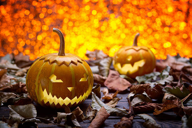istock Pumpkin for Halloween dry leaves 596068074