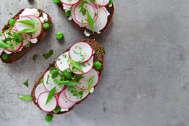 istock toast with ricotta, radish and green peas 596070348