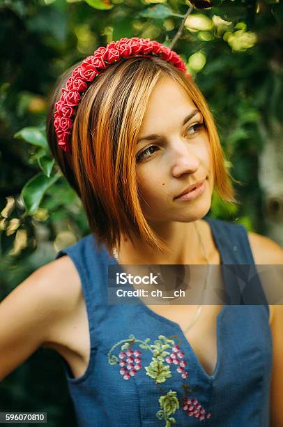 Portrait Of A Beautiful Young Woman Wearing Stock Photo - Download Image Now - Adult, Females, Photography