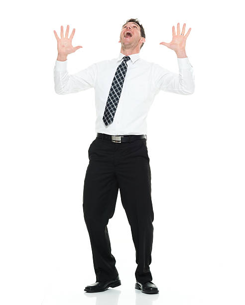istock Cheerful businessman looking up 596071376