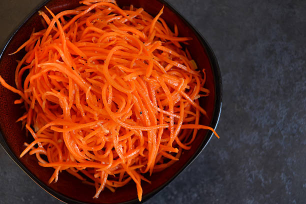 istock marinated, spicy carrots with spices, oriental cuisine 596072300