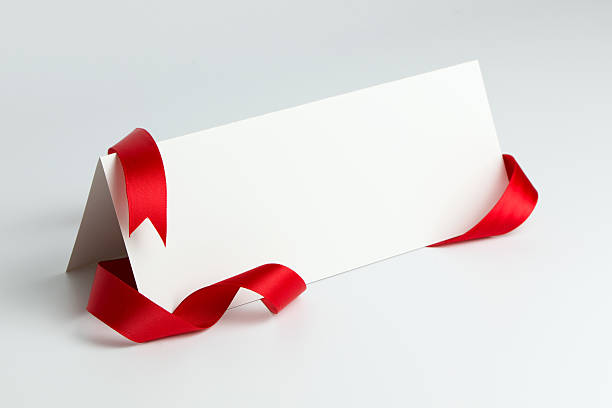 istock Blank card with red ribbon 596072574