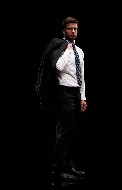 istock Businessman standing and looking at camera 596075192