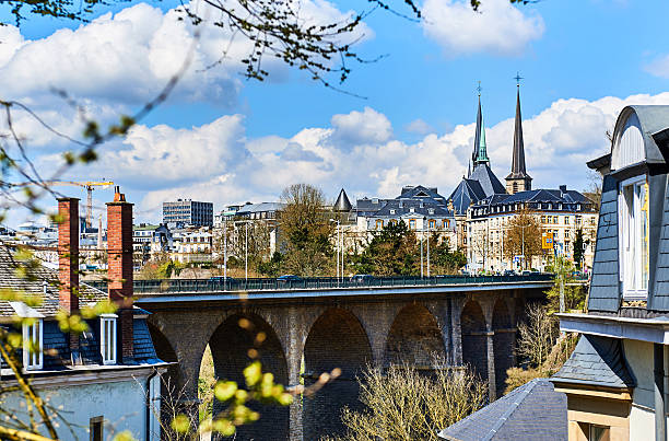 Luxembourg skyline Picturesque Luxembourg city. Passerelle Bridge and steeples of Notre Dame Cathedral. Luxembourg, Western Europe notre dame cathedral of luxembourg stock pictures, royalty-free photos & images